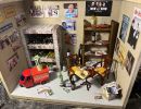 Diorama Frontansicht zur Hochzeit eines Paares, welches u.a. Weine, Familie, gutes Essen ihren Oldtimer liebt